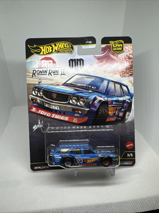 Hot Wheels 2025 Premium Mad Mike Mazda RX-3 Wagon Remorque Ronin Run 2 / A28